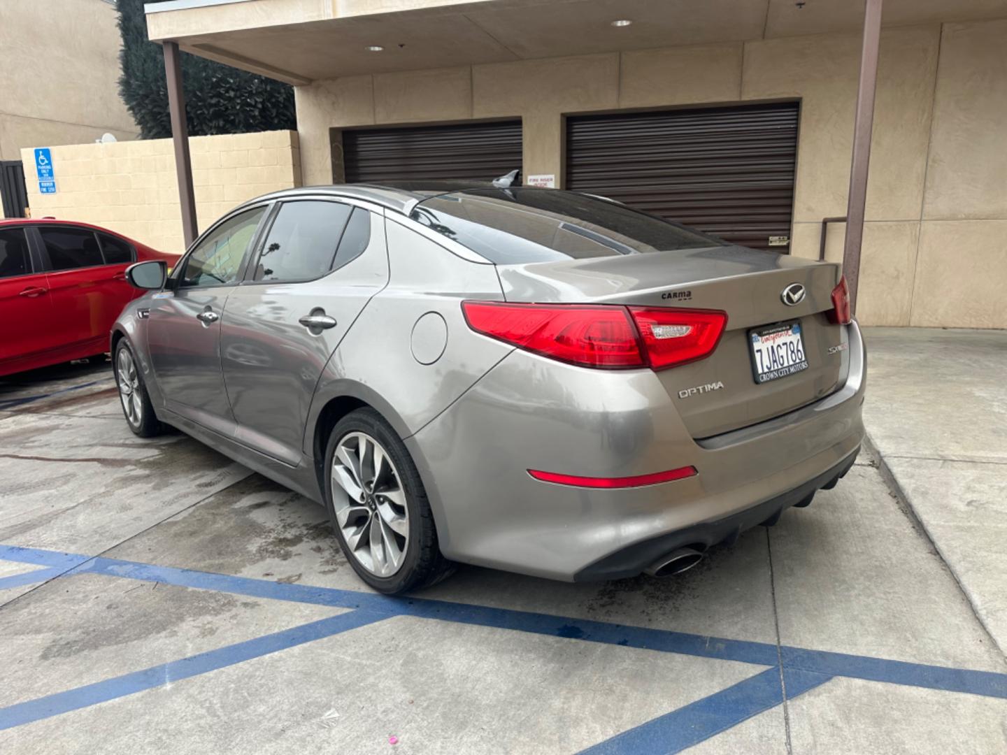 2014 Gray /BLACK Kia Optima SX Turbo (5XXGR4A62EG) with an 2.0L L4 DOHC 16V TURBO engine, 6-Speed Automatic transmission, located at 30 S. Berkeley Avenue, Pasadena, CA, 91107, (626) 248-7567, 34.145447, -118.109398 - New tires! Moon Roof! Nice Interior! Looks and drives good! Bad credit? We can help! We are the bank. All our cars are thoroughly inspected and reconditioned by our technicians. FREE CARFAX report. Stop by or call to speak with our friendly staff. Whether you have bad credit, no credit, bankruptcy, - Photo#2